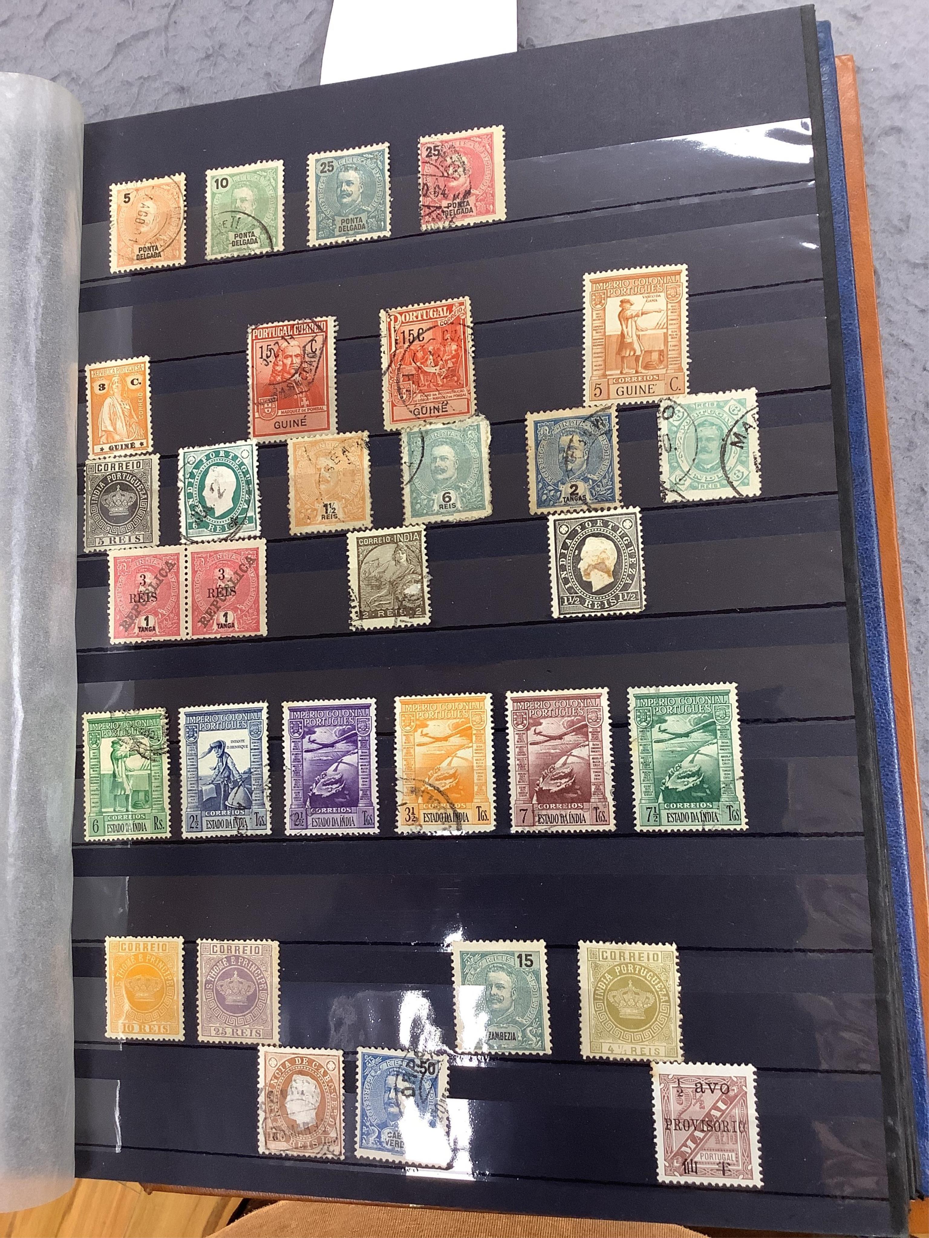 Four albums of stamps: Newfoundland, Jamaica etc (4). Condition - mostly stamp marked